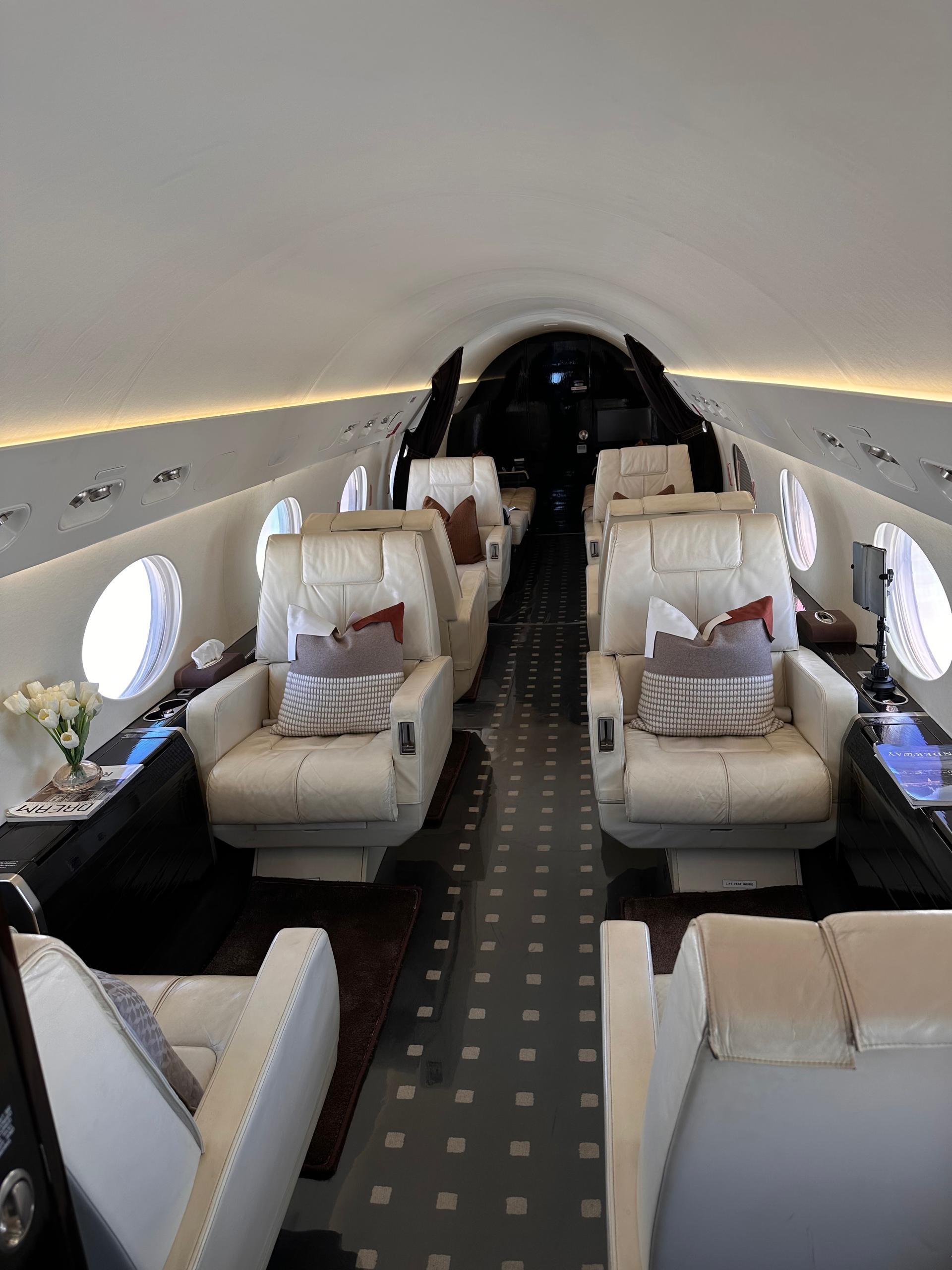 Eagle Airways private jet cabin aisle